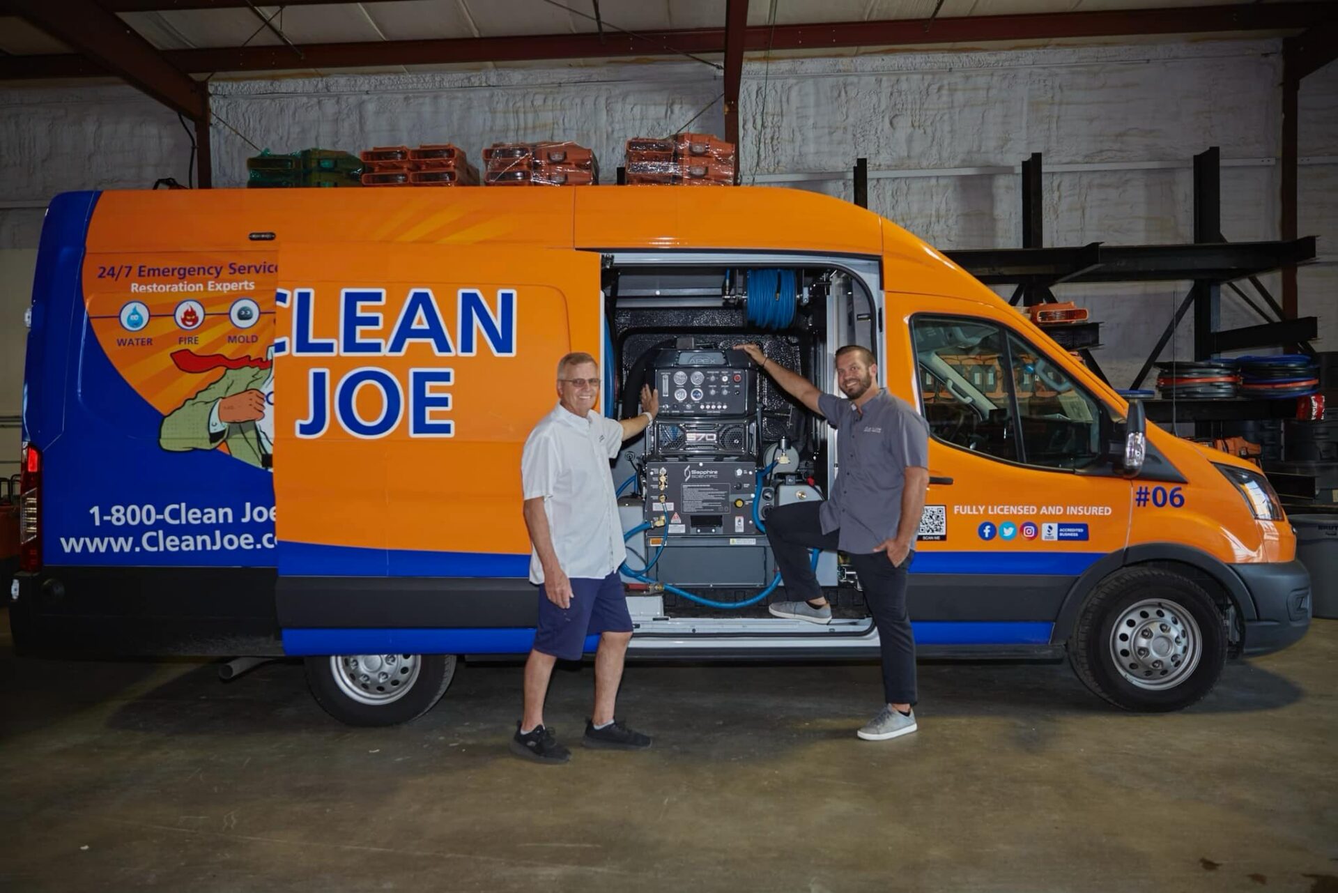 Clean Joe founder and son, the second generation owners, standing beside a Clean Joe truck-mounted extraction van